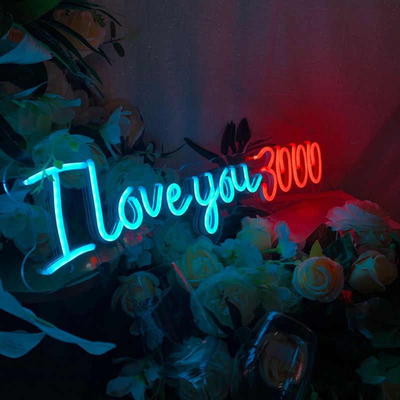 A beautifully crafted SELICOR neon sign with I Love You 3000 written in bright enchanting hues ideal for wedding celebrations
