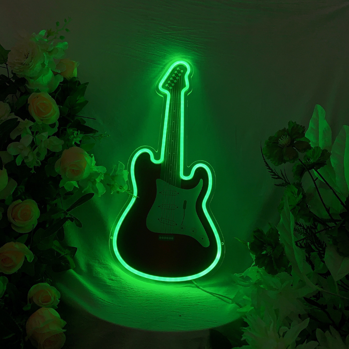 Guitar-shaped neon sign with pulsating RGB color variations.