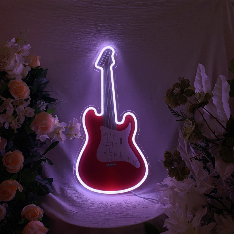 Neon sign in the shape of a guitar, cycling through various vibrant RGB hues.