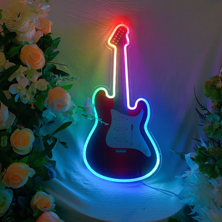 Dynamic RGB-lit guitar-shaped neon sign cycling through vivid colors.