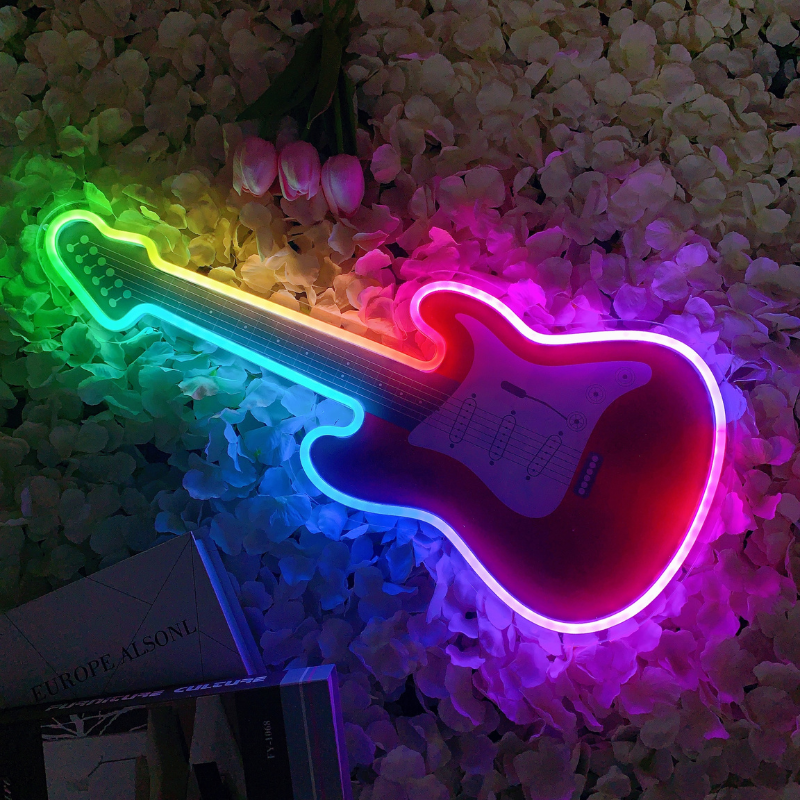 Electric guitar neon light with dynamic RGB color transitions.